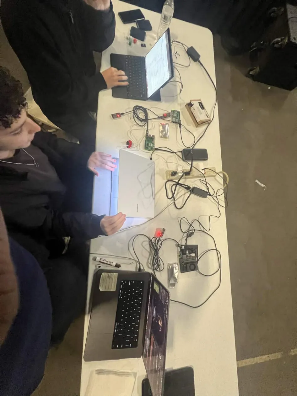 The team building Hormuz Watch at the hackathon